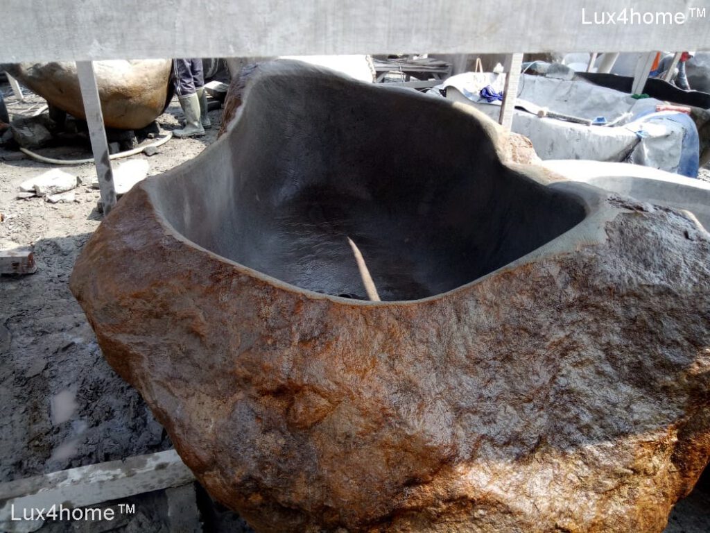 Basalt boulder bathtub - stone tubs