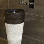 black marble pedestal sink