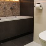 bathroom pebble tile ideas - Beige Pebble wall