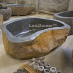 Vasche in pietra naturale: idee, forme e materiali