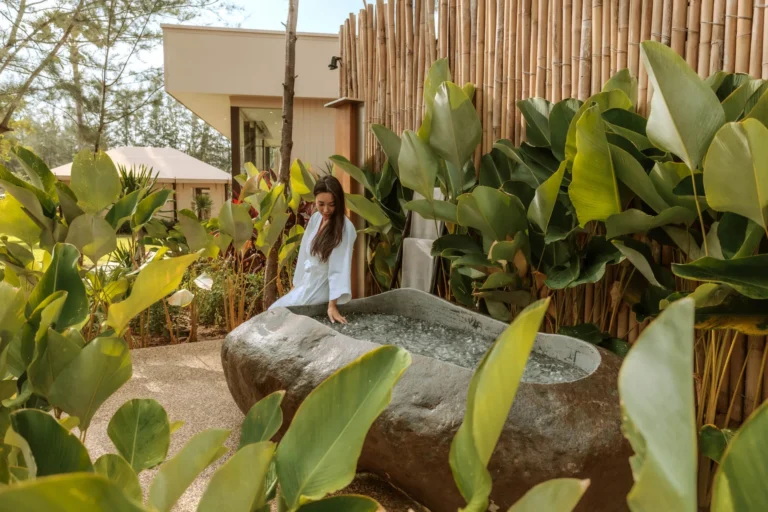 An Outdoor Stone Ice Bath at Twinpalms Phuket: The Eclipse Project 1 Eclipse stone bathtub filled with water and ice in the tropical garden at Twinpalms Phuket